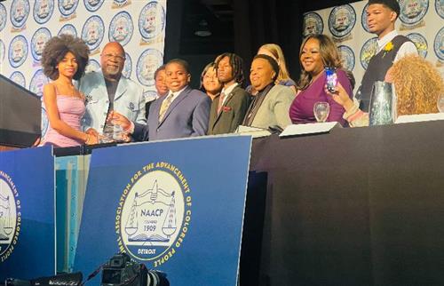 Robotics Team on Stage with Rev. Wendell Anthony